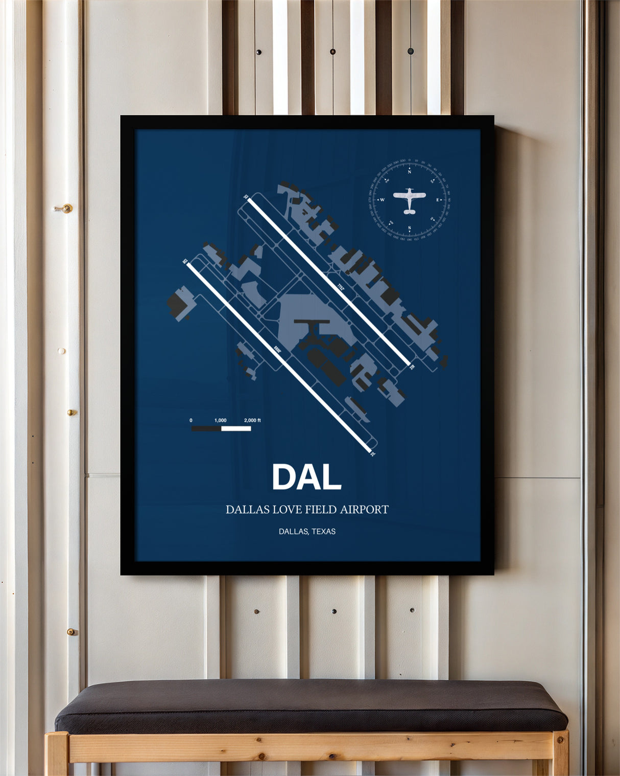 Dallas Love Field Airport framed poster displayed in an airplane hangar