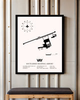 South Jersey Regional Airport framed poster displayed in an airplane hangar