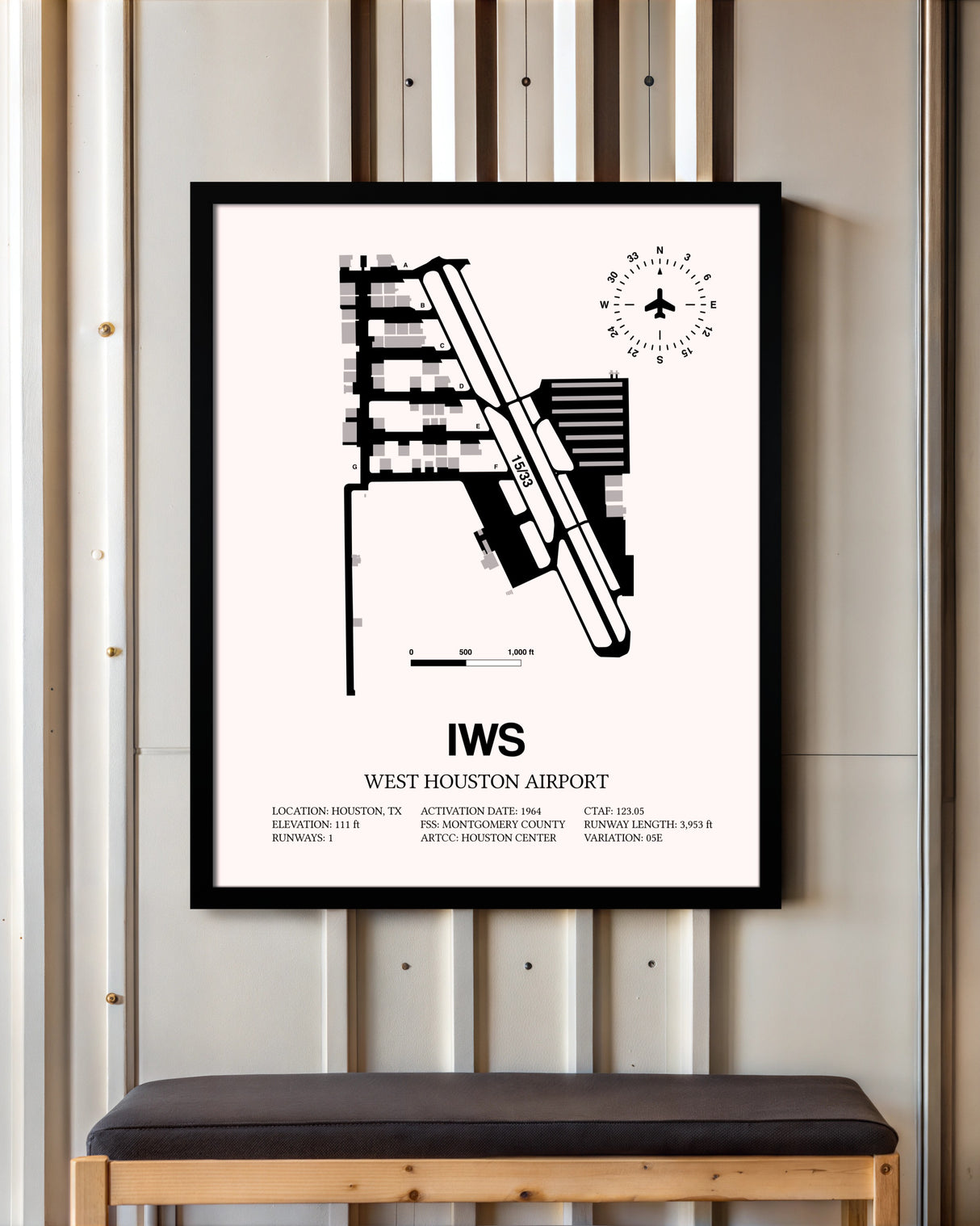 West Houston Airport framed poster displayed in an airplane hangar