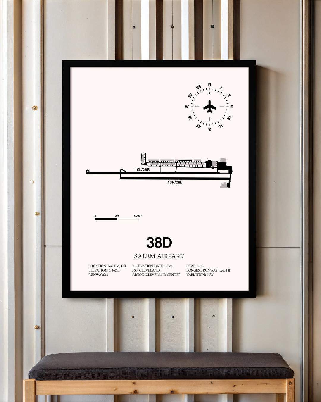 Salem Airpark framed poster displayed in an airplane hangar