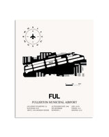 Gray Fullerton Municipal Airport framed poster displayed in an airplane hangar