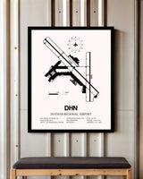 Dothan Regional Airport framed poster displayed in an airplane hangar