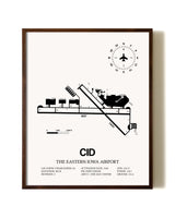 The Eastern Iowa Airport aviation print in walnut frame