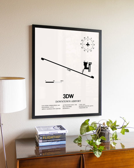 Downtown Airport aviation wall décor in black wood frame