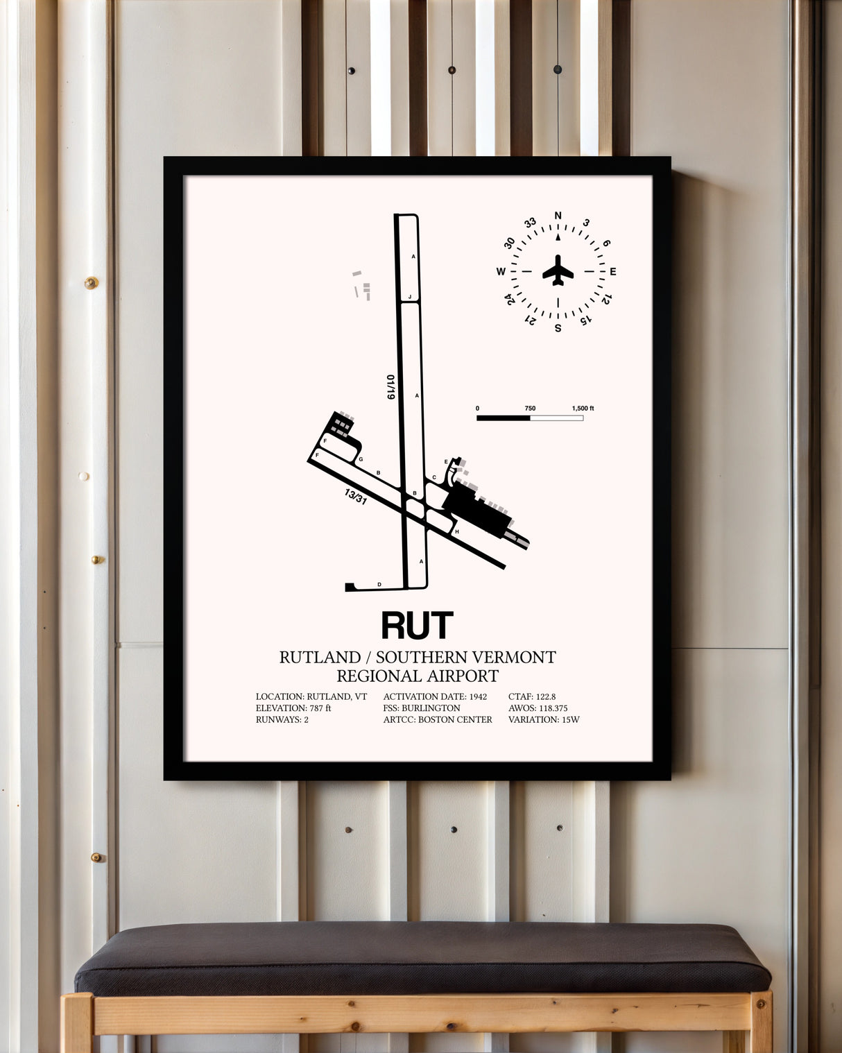 Rutland / Southern Vermont Regional Airport framed poster displayed in an airplane hangar