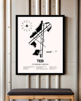 Teterboro Airport framed poster displayed in an airplane hangar