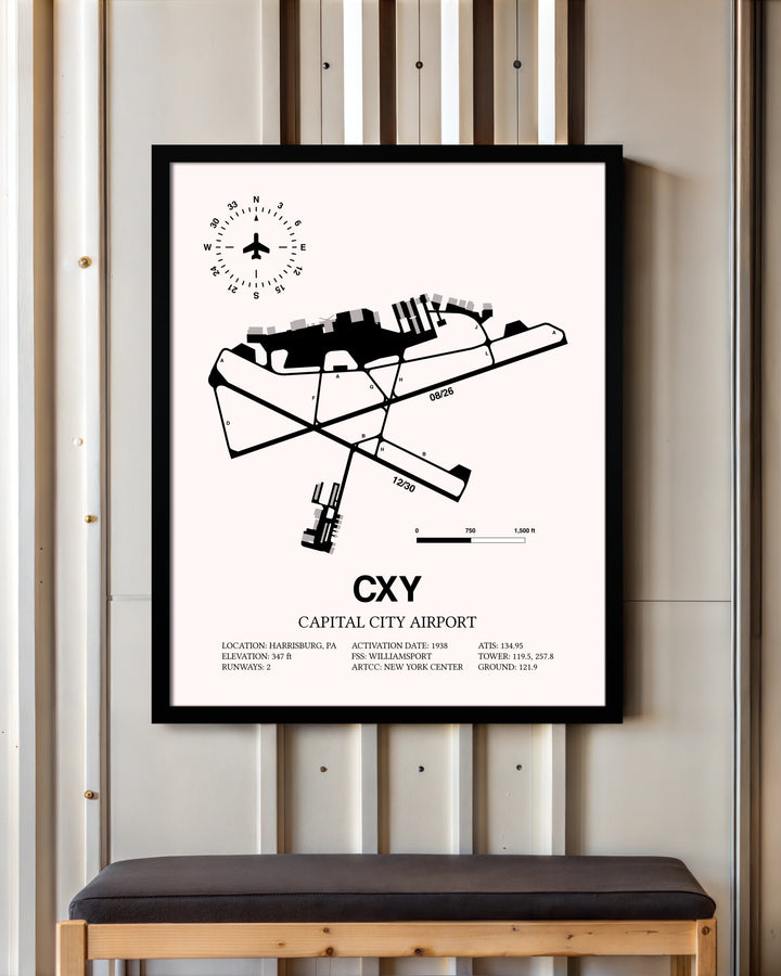 Capital City Airport framed poster displayed in an airplane hangar