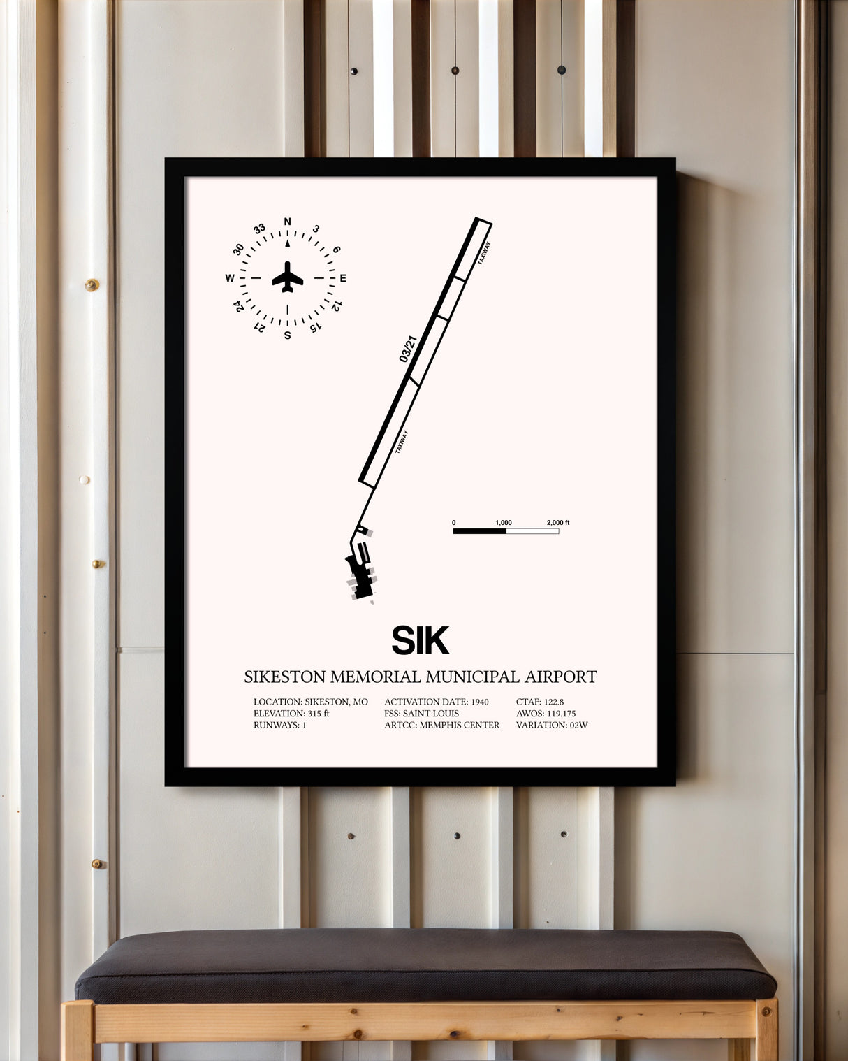 Sikeston Memorial Municipal Airport framed poster displayed in an airplane hangar