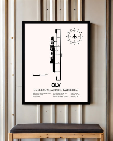 Olive Branch Airport / Taylor Field framed poster displayed in an airplane hangar