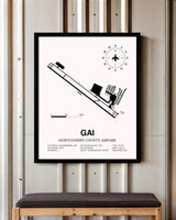 Montgomery County Airpark framed poster displayed in an airplane hangar