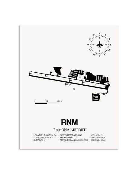 Gray Ramona Airport framed poster displayed in an airplane hangar
