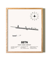 Piney Creek Airport framed print in natural wood frame