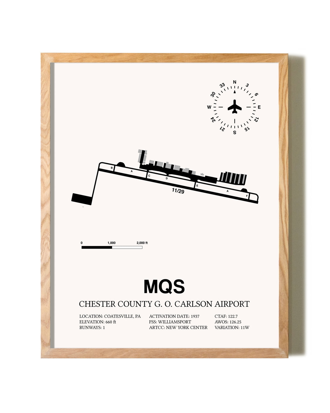 Chester County G. O. Carlson Airport framed print in natural wood frame