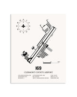 Gray Clermont County Airport framed poster displayed in an airplane hangar