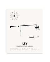 Gray Liberty County Airport framed poster displayed in an airplane hangar