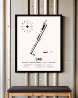 Winona - Montgomery County Airport framed poster displayed in an airplane hangar