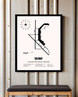 Malden Regional Airport framed poster displayed in an airplane hangar