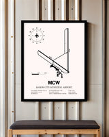 Mason City Municipal Airport framed poster displayed in an airplane hangar