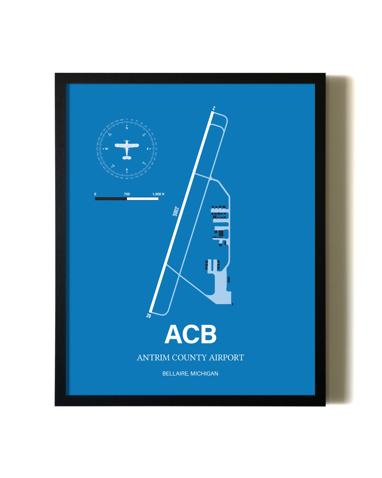 Sky Blue Antrim County Airport aviation wall décor in black wood frame