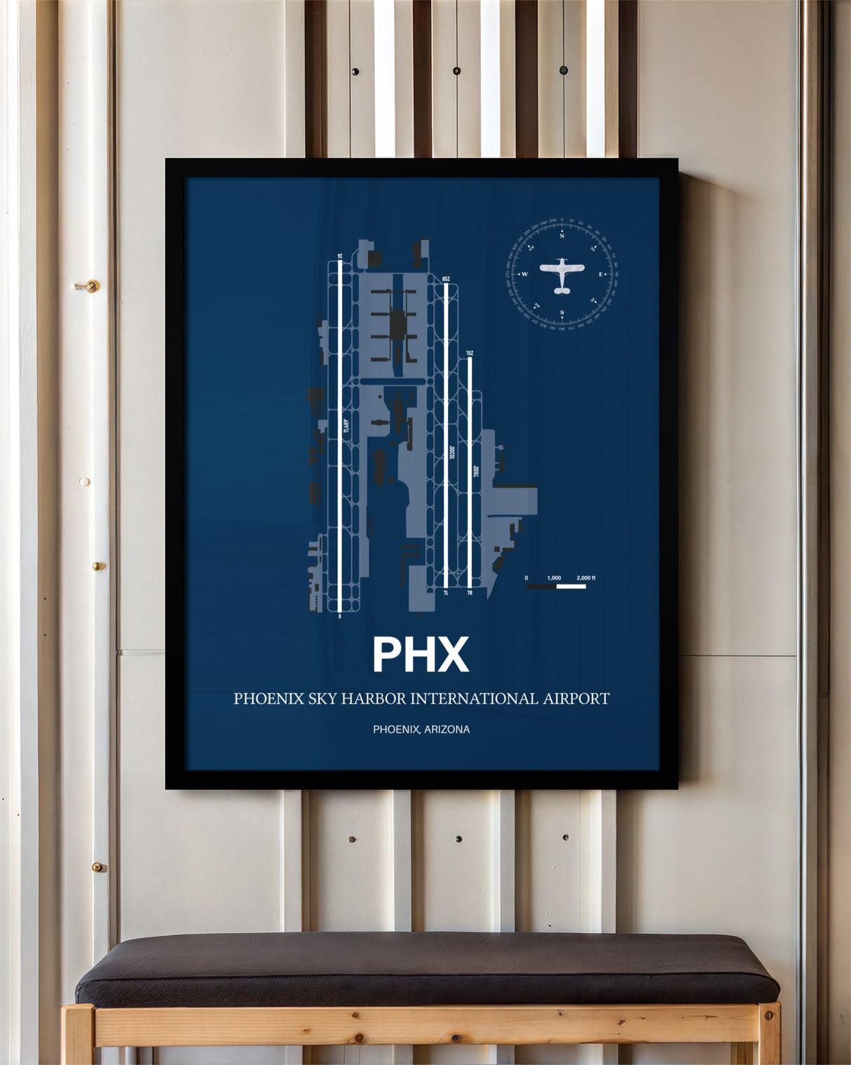 Phoenix Sky Harbor International Airport framed poster displayed in an airplane hangar