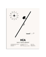 Gray Holy Cross Airport framed poster displayed in an airplane hangar