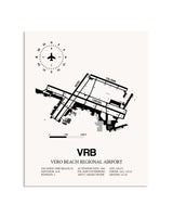 Gray Vero Beach Regional Airport framed poster displayed in an airplane hangar