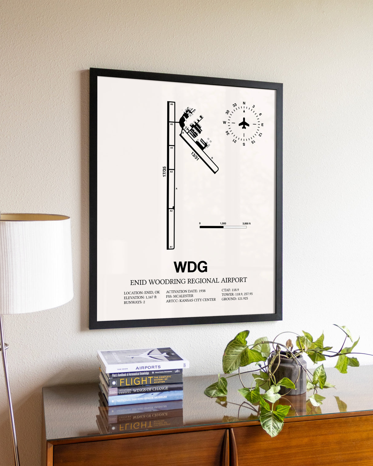 Enid Woodring Regional Airport aviation wall décor in black wood frame