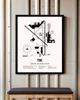 Tinker Air Force Base framed poster displayed in an airplane hangar