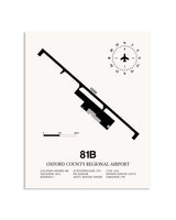 Gray Oxford County Regional Airport framed poster displayed in an airplane hangar