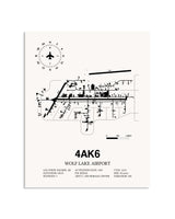 Gray Wolf Lake Airport framed poster displayed in an airplane hangar