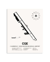 Gray Cambridge-Dorchester Regional Airport framed poster displayed in an airplane hangar