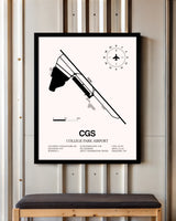 College Park Airport framed poster displayed in an airplane hangar