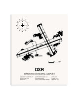 Gray Danbury Municipal Airport framed poster displayed in an airplane hangar