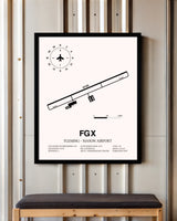 Fleming-Mason Airport framed poster displayed in an airplane hangar