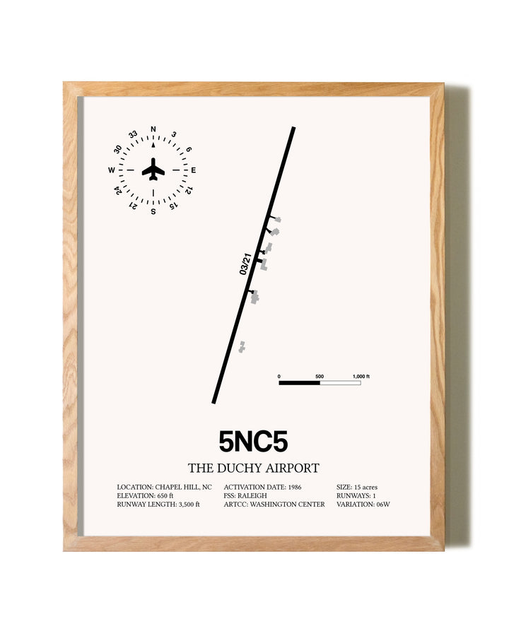 The Duchy Airport framed print in natural wood frame
