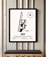 Sulphur Springs Municipal Airport framed poster displayed in an airplane hangar