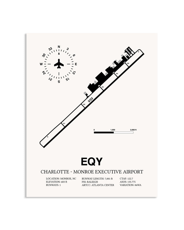 Gray Charlotte-Monroe Executive Airport framed poster displayed in an airplane hangar