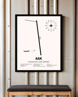 Livengood Camp Airport framed poster displayed in an airplane hangar