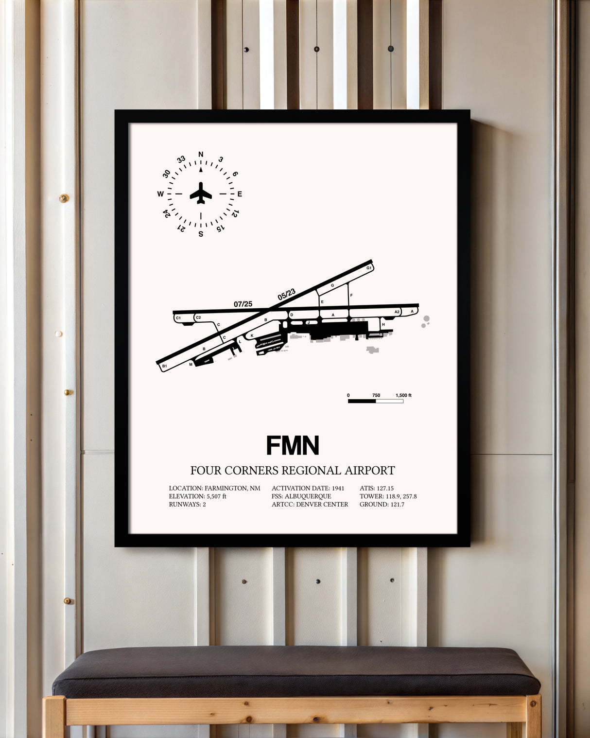 Four Corners Regional Airport framed poster displayed in an airplane hangar