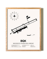 Brunswick Golden Isles Airport framed print in natural wood frame